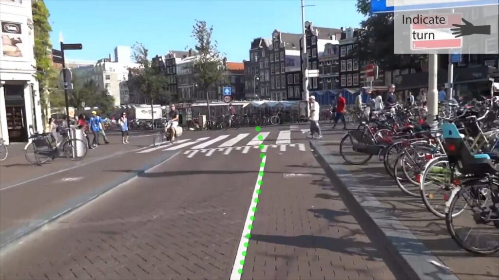 AR prototype view: indicate-turn sign before a crossing